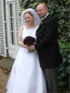 Lisa and Simon standing outside after marriage